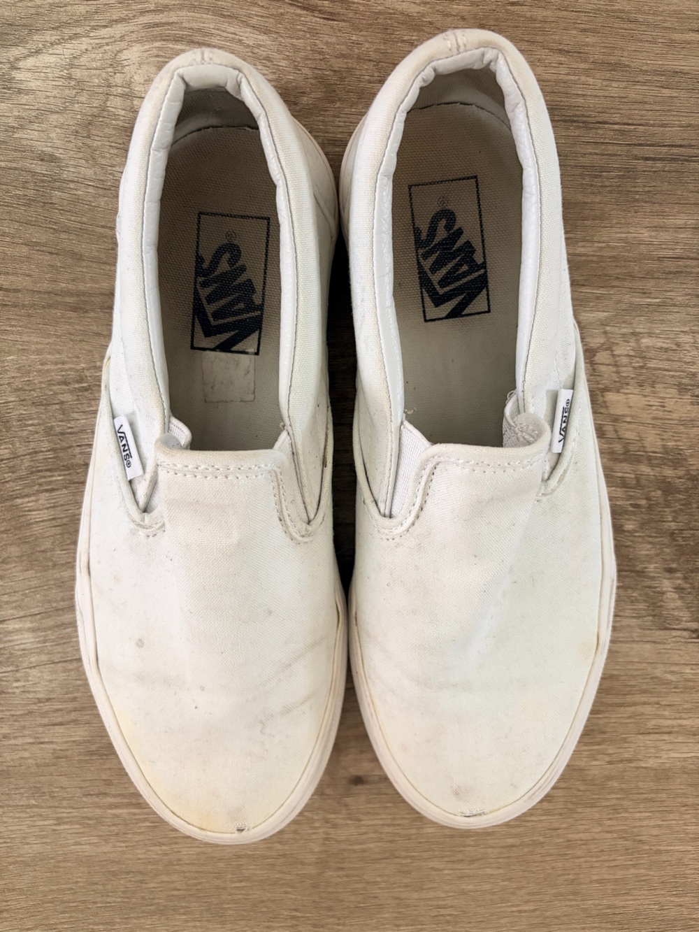 Vans White Canvas Slip-On Sneakers